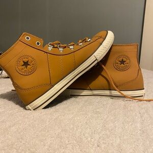 brown leather Converse